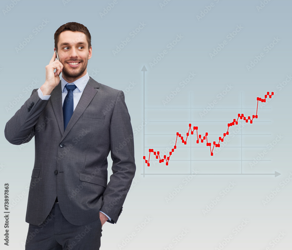 young smiling businessman talking with smartphone young smiling businessman talking with smartphone