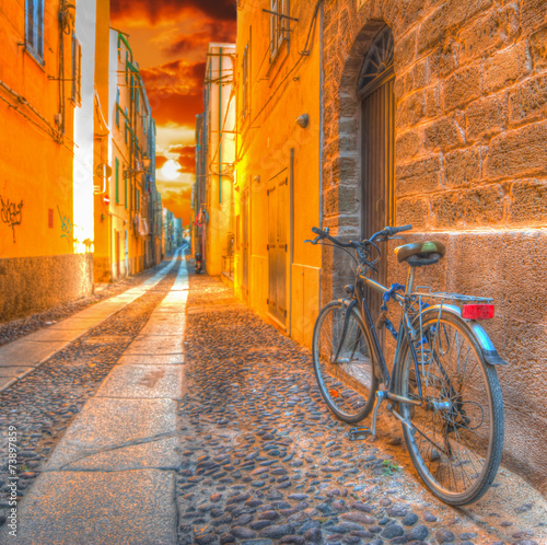 bicycle in Alghero under a scenic sunset