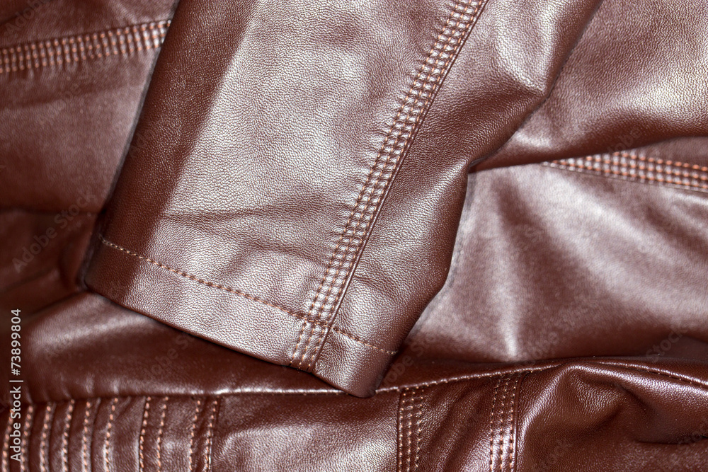 background of brown leather background of brown leather