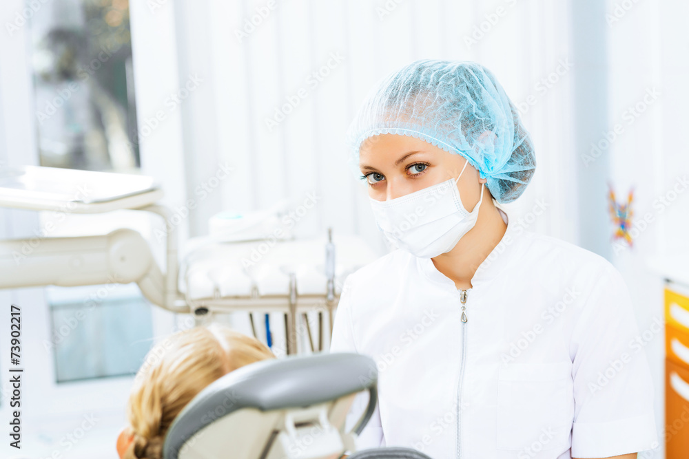 Dentist inspecting patient Dentist inspecting patient