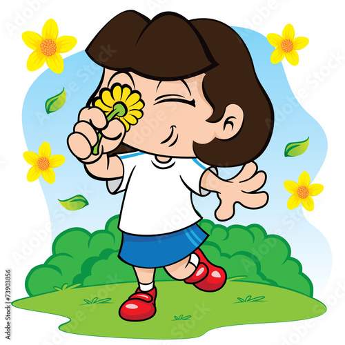 Student girl smelling flowers in the park