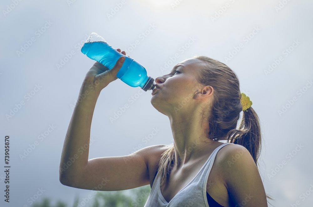 thirsty athlete with power drink Stock Photo Adobe Stock