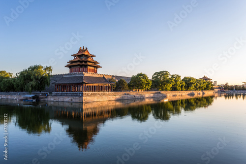 moat and watchtower of imperial palace in Beijign, china photo