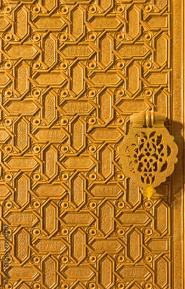 Seville - Detail of mudejar gate of north entry to the Cathedral