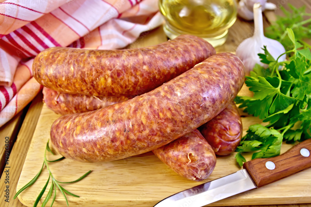 Sausages beef on board with knife