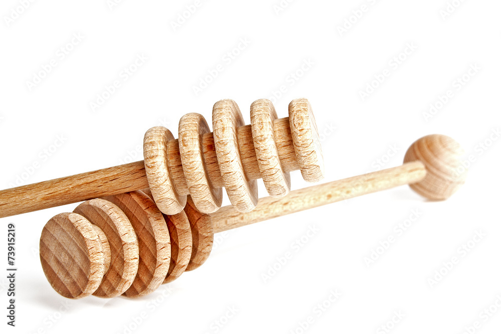 Wooden spoons for honey on a white background Wooden spoons for honey on a white background