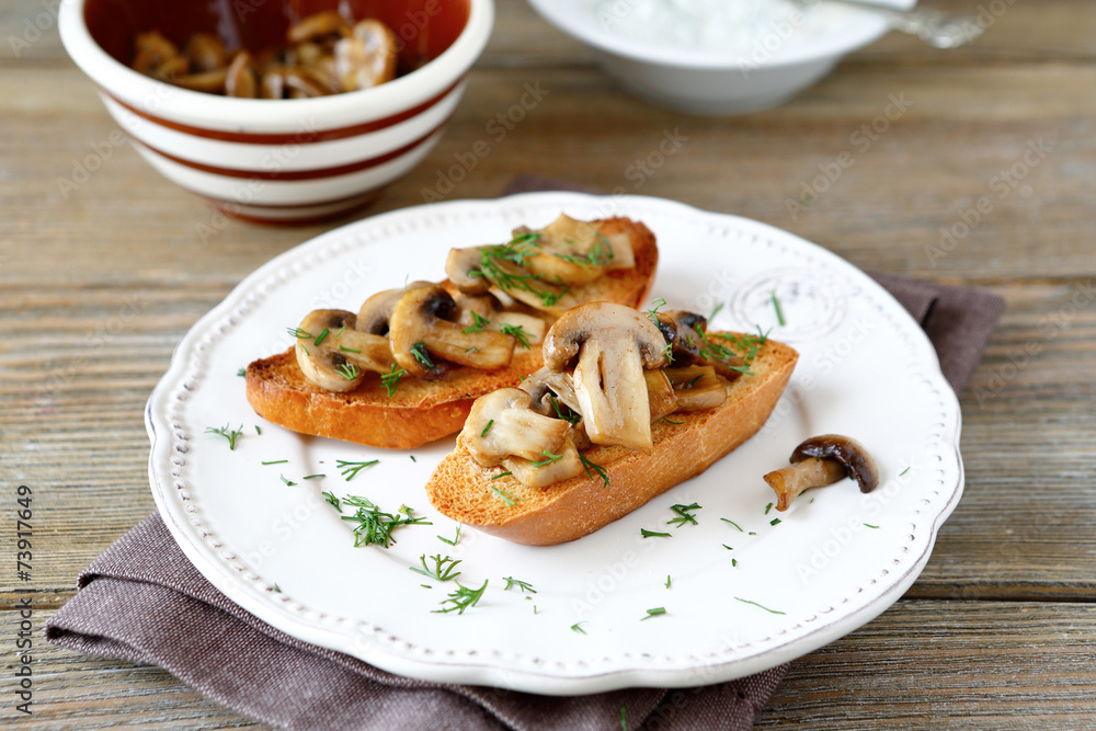 Delicious toast with mushrooms
