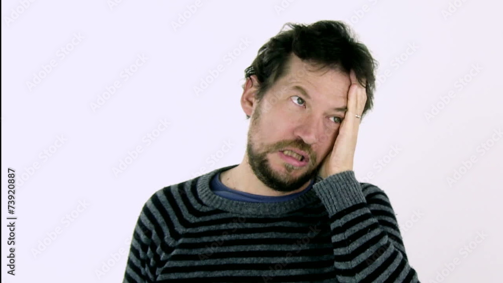 Man feeling tired and starting to feel flu and headache Man feeling tired and starting to feel flu and headache