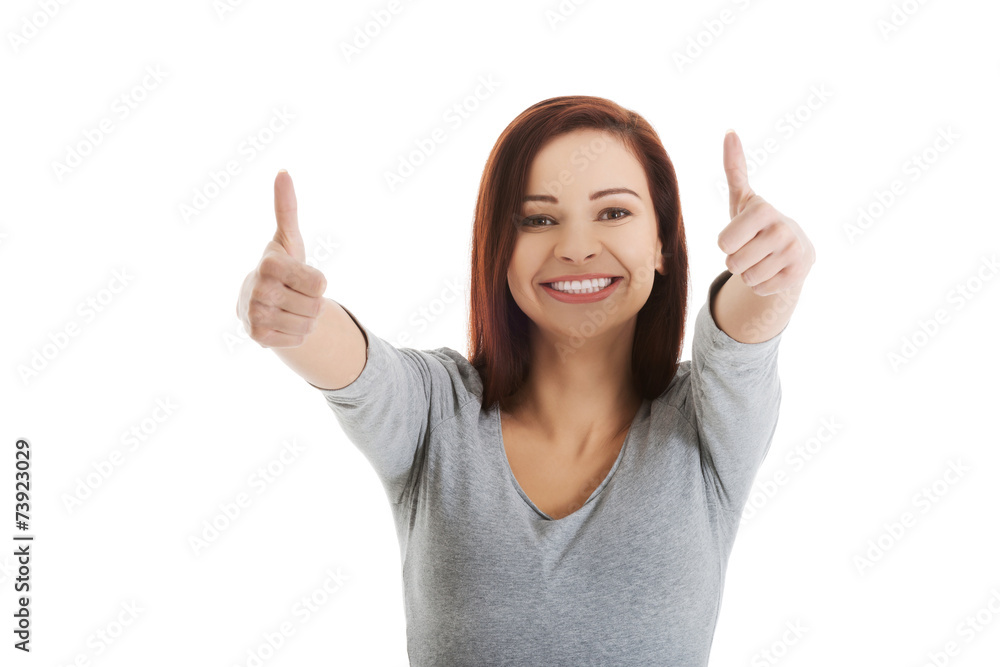 Portrait of smiling woman with thumbs up Portrait of smiling woman with thumbs up