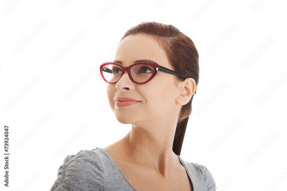 Portrait of a woman in eyewear looking up