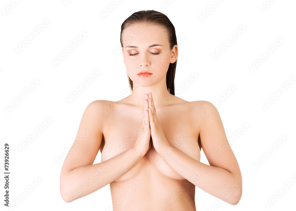 Portrait nude woman with clenched hands to pray Portrait nude woman with clenched hands to pray