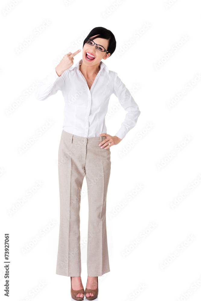 Annoyed woman making obscene hand gesture Annoyed woman making obscene hand gesture