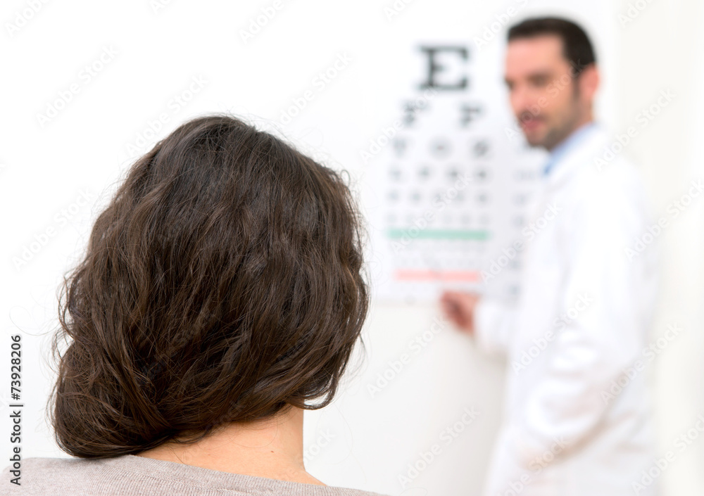 Young attractive woman doing optician test Young attractive woman doing optician test