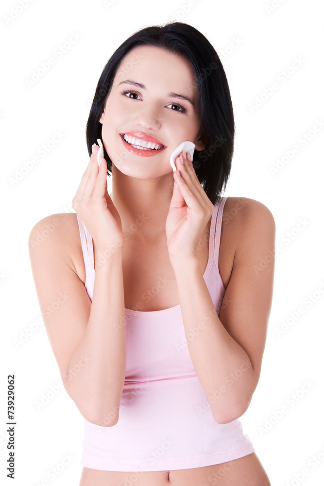 Portrait of a woman removing makeup Portrait of a woman removing makeup