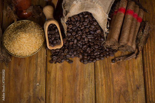 Photography Overhead view on table with cuban cigars and other products
