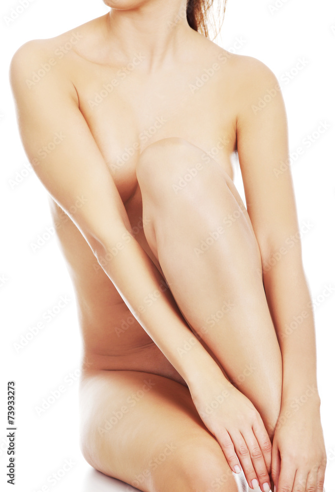 Fototapeta premium Close up nude woman sitting on the floor