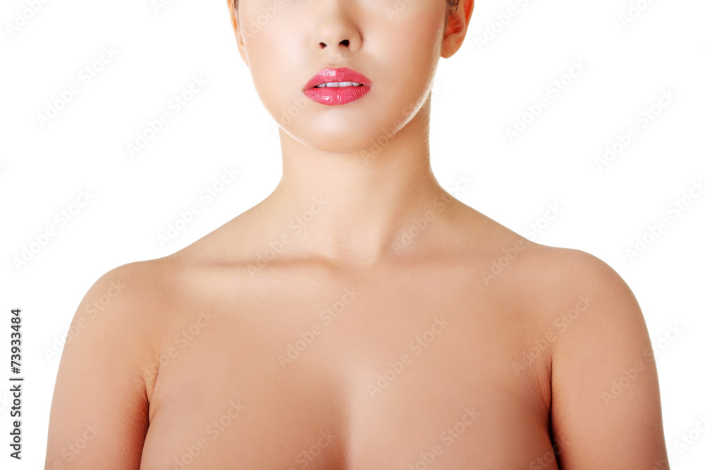 Foto de Close up on nude woman chest do Stock