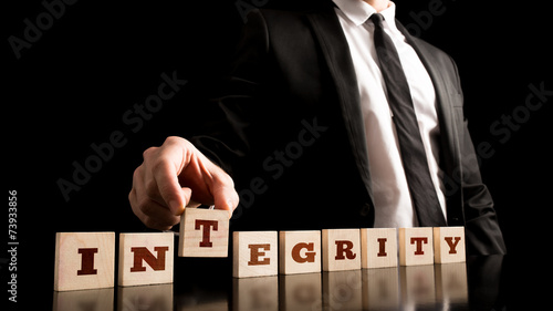 Photography Integrity on Wooden Piece Arranged by Businessman