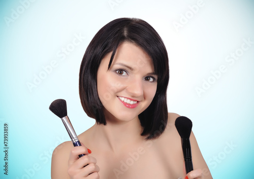 girl with two makeup brush