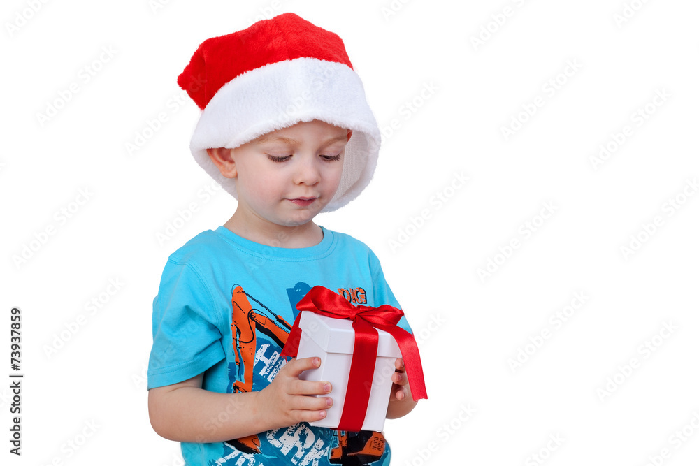 Obraz premium Child with santa hat and gift packs