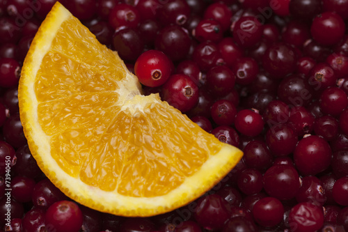 Orange slice in cranberries