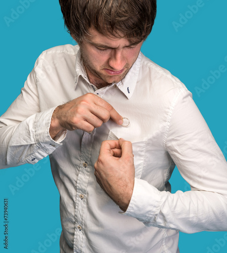 Photos Man hiding his wedding ring in his shirt pocket