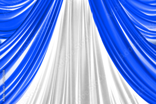 blue and white curtain on stage