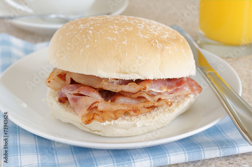 Bacon sandwich or bacon breakfast roll photo