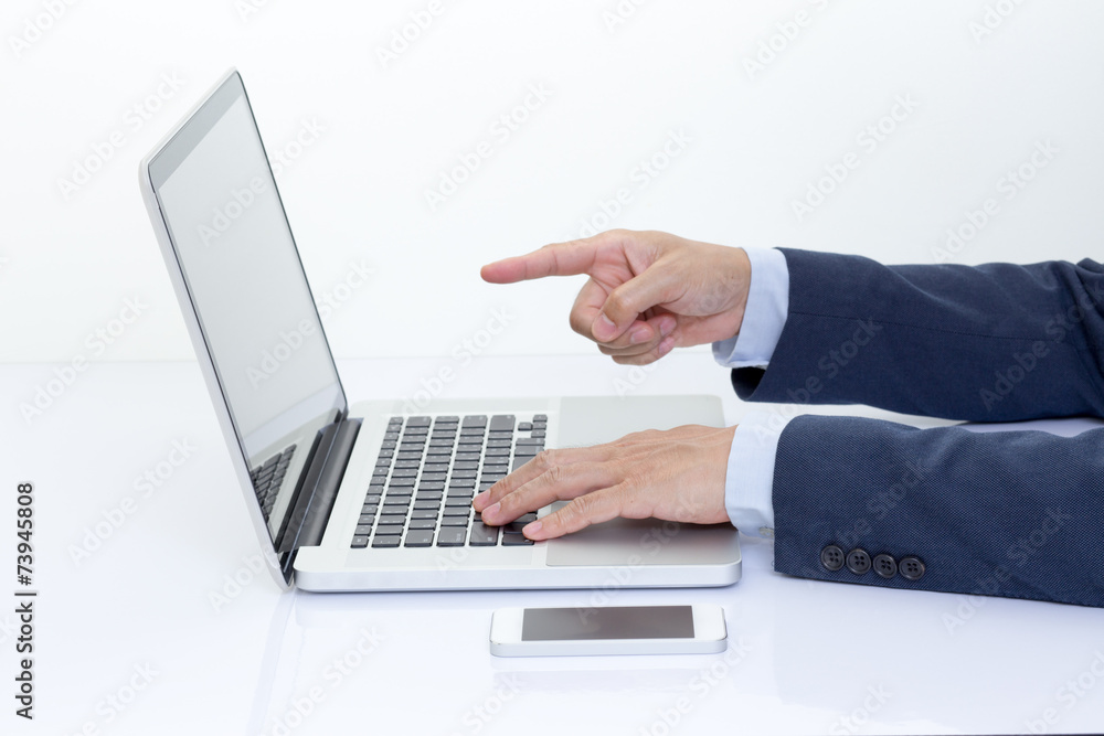 Businessman hands typing on laptop computer Businessman hands typing on laptop computer