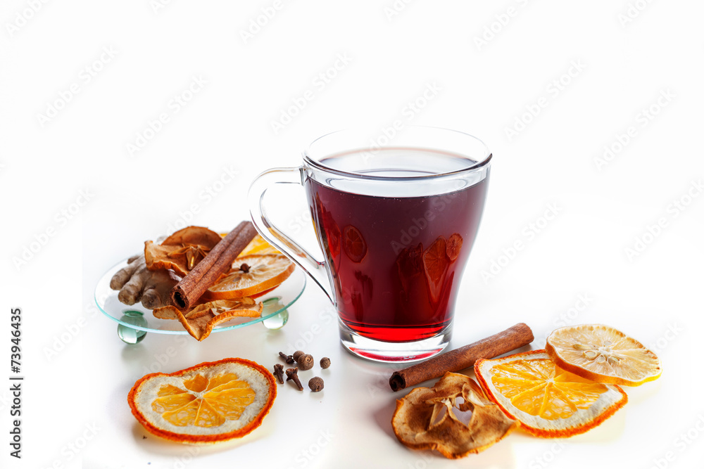 mulled wine with spices, ginger, cinnamon on a white background mulled wine with spices, ginger, cinnamon on a white background