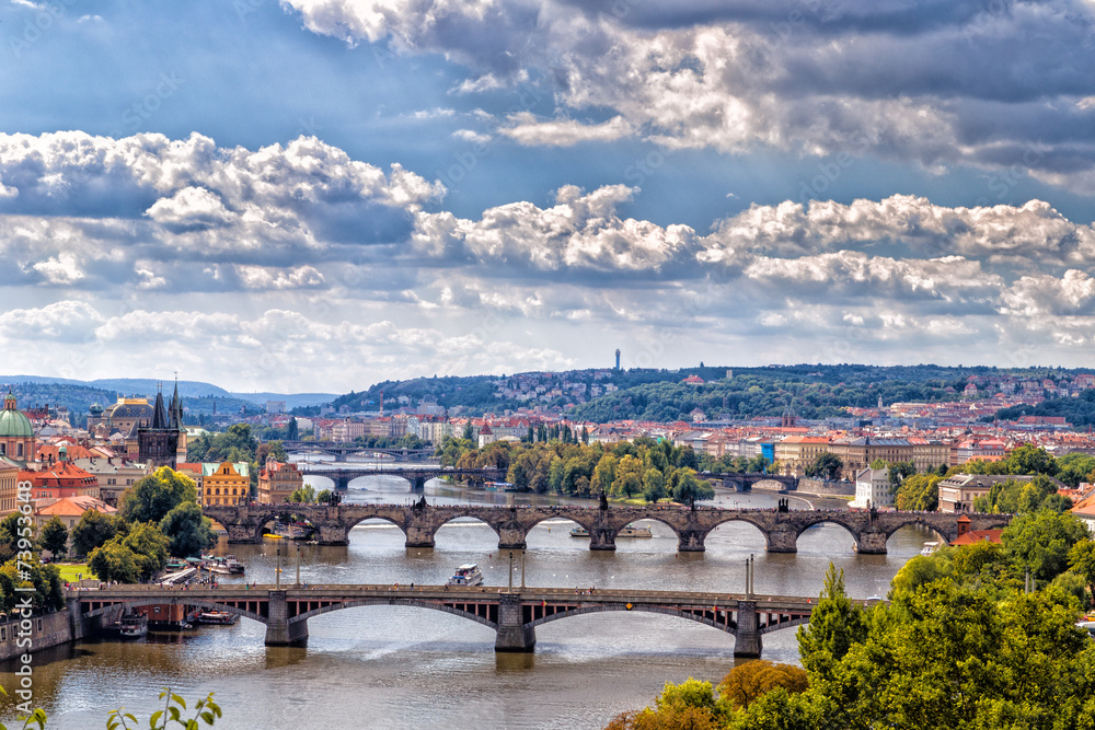 Fototapeta premium Bridge and rooftops of Prague