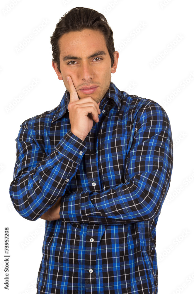 young handsome man wearing a blue plaid shirt posing young handsome man wearing a blue plaid shirt posing