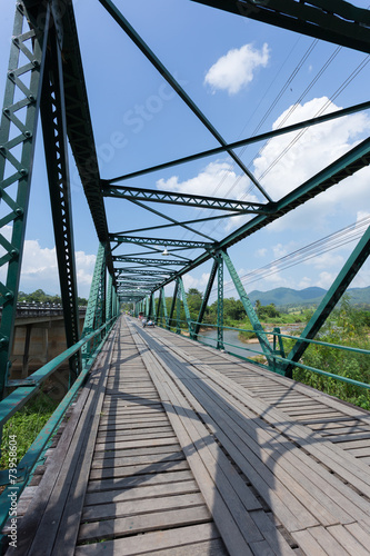 Fototapeta Naklejka Na Ścianę i Meble -  iron bridge at pai river in thailand