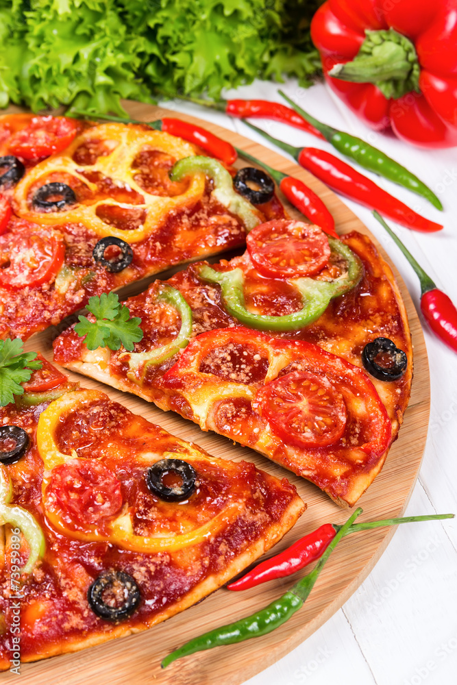 Pizza with tomatoes, peppers and olives