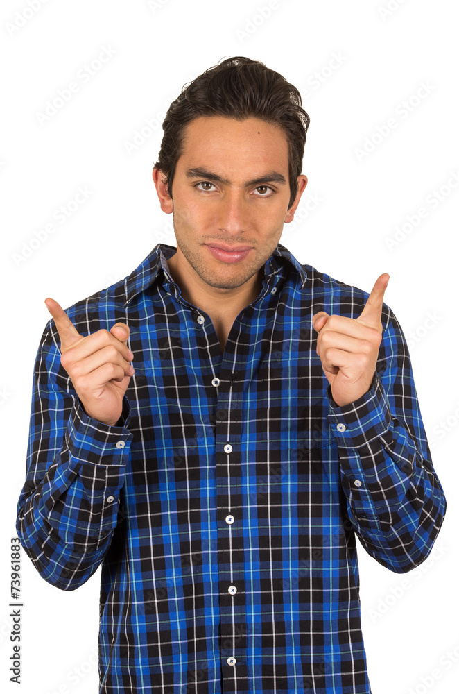 handsome young latin man wearing a blue plaid shirt posing with handsome young latin man wearing a blue plaid shirt posing with