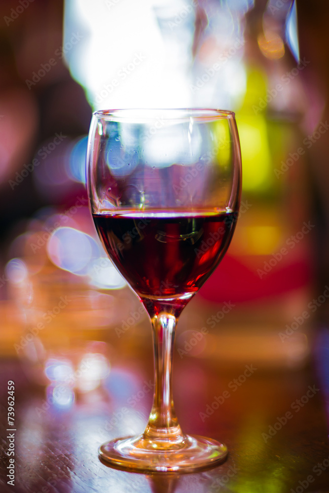 Glass of red wine with a blurred out bokeh background
