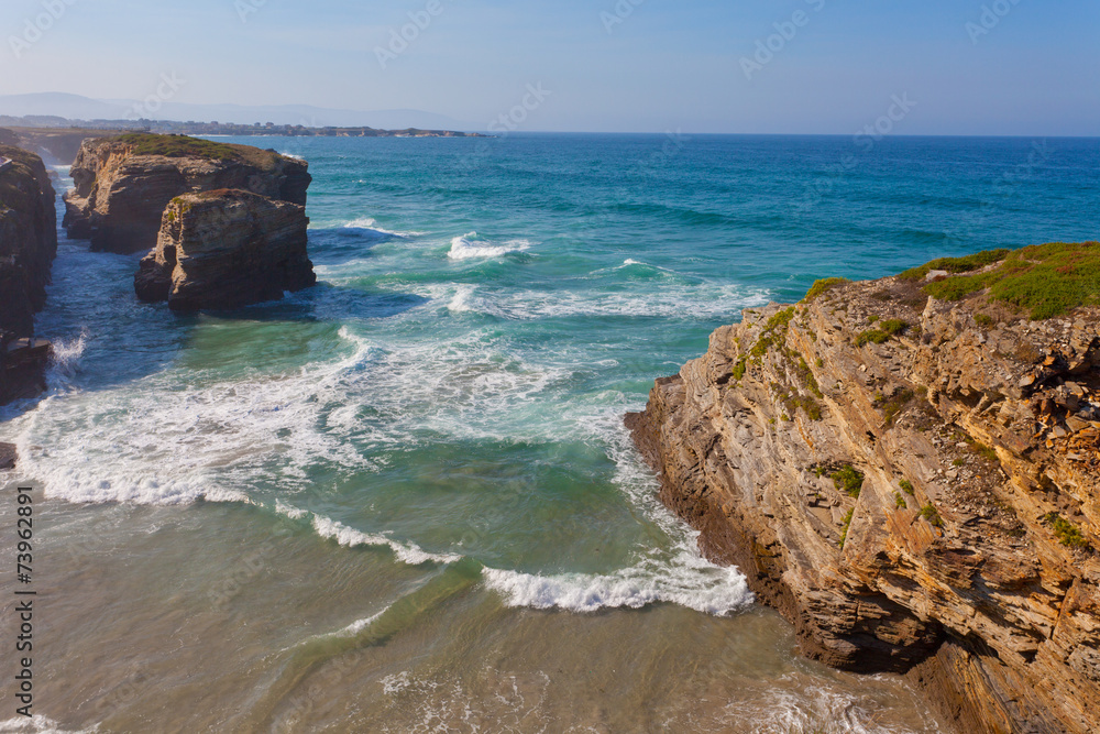 Portugal, waves of the Atlantic Ocean break about coastal rocks Portugal, waves of the Atlantic Ocean break about coastal rocks