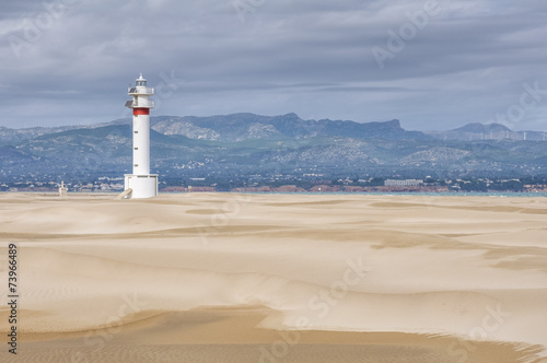 Obraz na płótnie Lighthouse and dunes in Punta del Fangar (Ebro Delta, Spain) w salonie