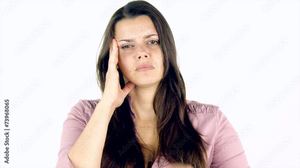 Closeup of woman with very strong headache Closeup of woman with very strong headache