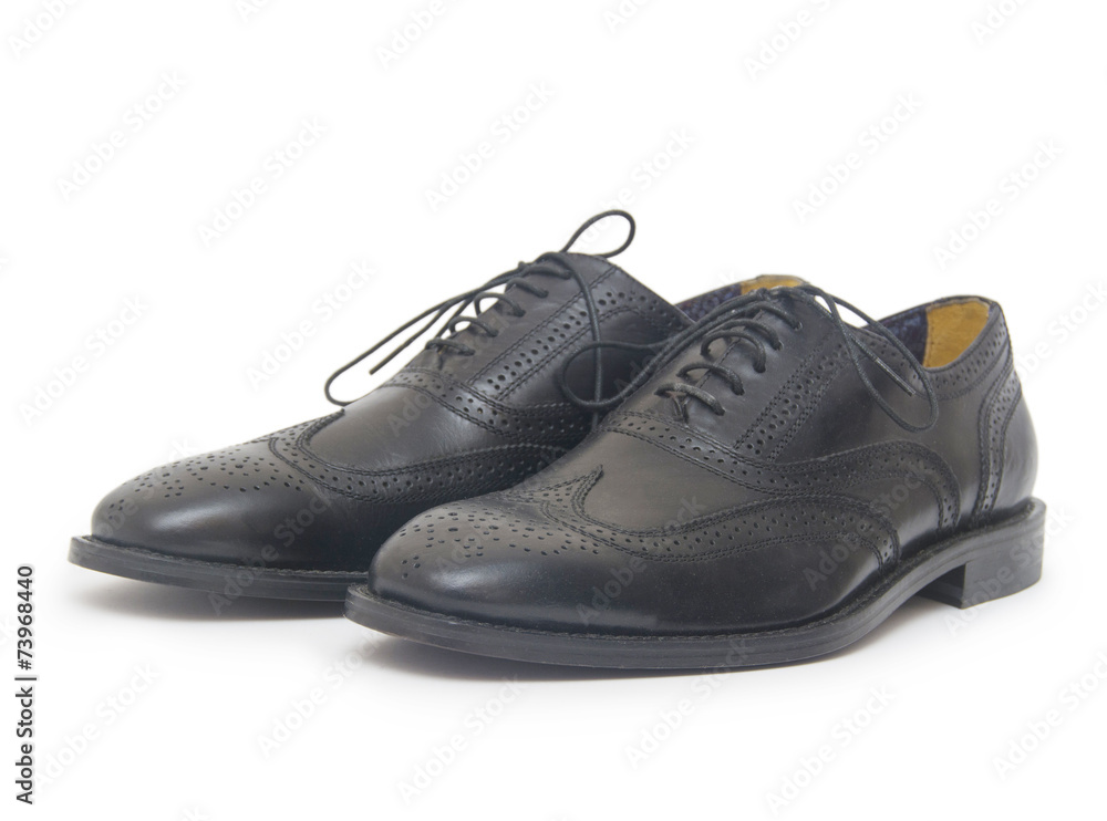 Close-up of mens shoes on white background Close-up of mens shoes on white background