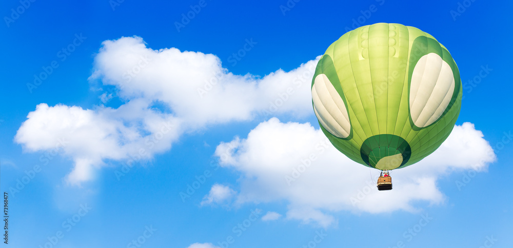 Naklejka premium Hot air balloon with blue sky background