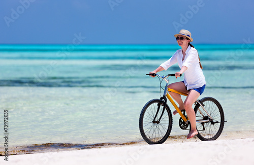 Young woman biking