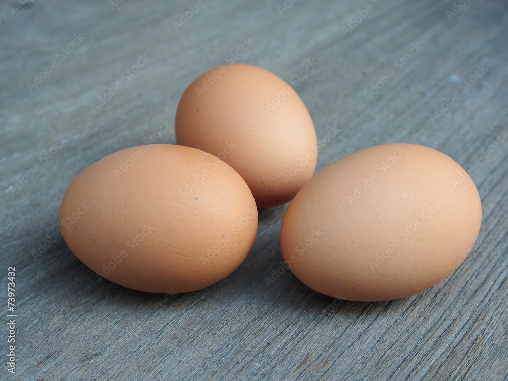 eggs on the wooden table eggs on the wooden table