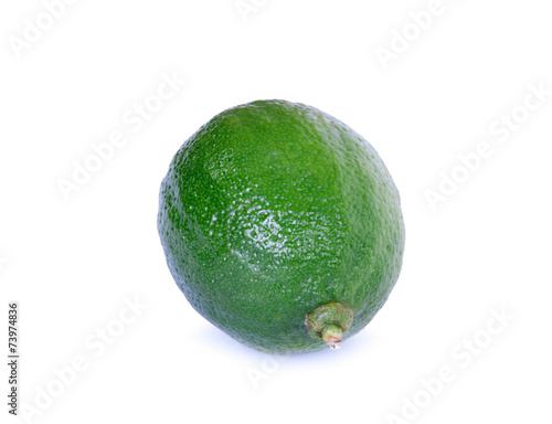 Image of green lime isolated over white background