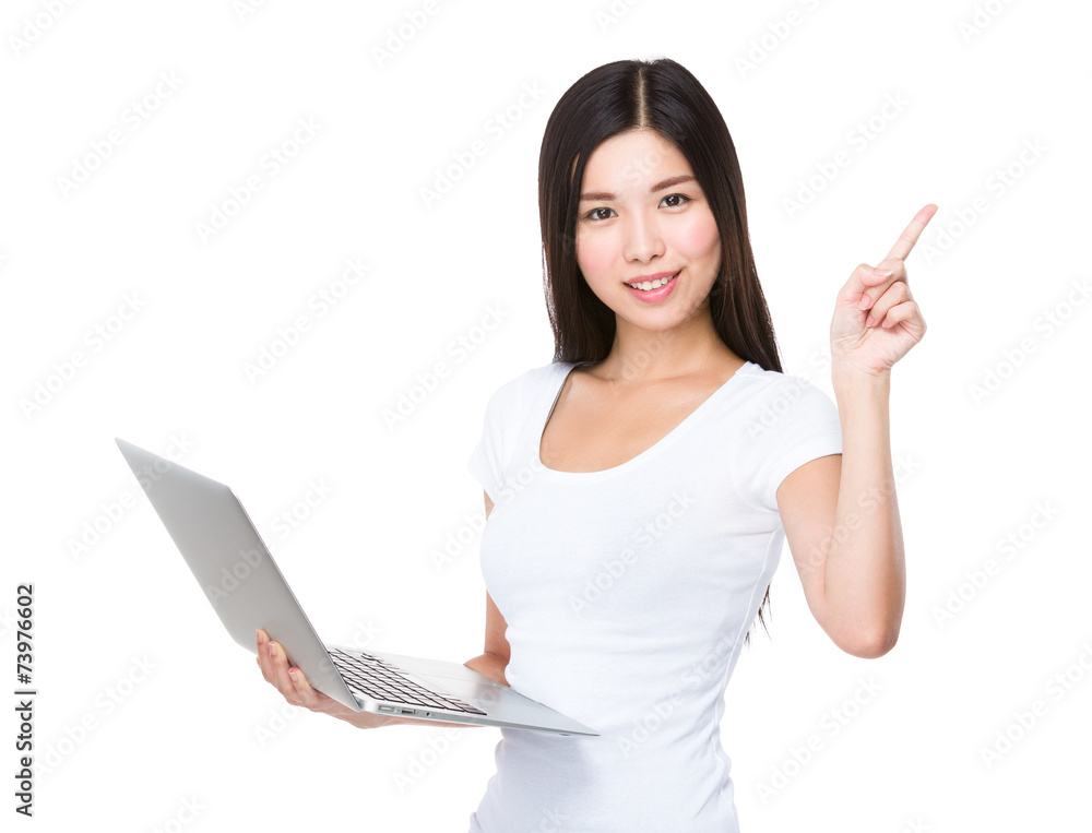 Woman use of notebook and finger point up