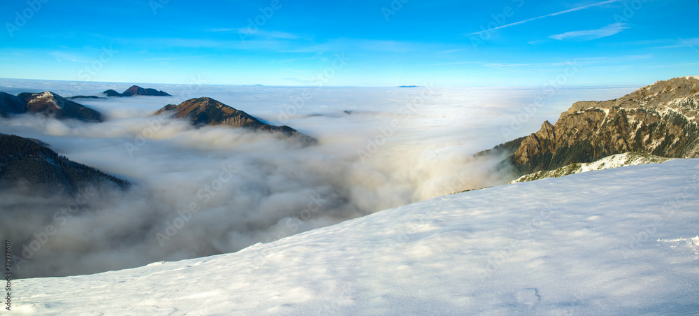 Mountains above clouds - Tatra Mountains in Poland Mountains above clouds - Tatra Mountains in Poland
