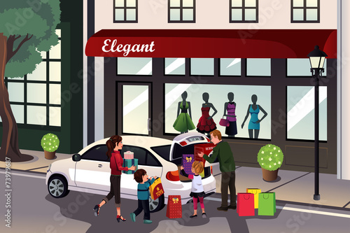 Family loading shopping stuff into the car