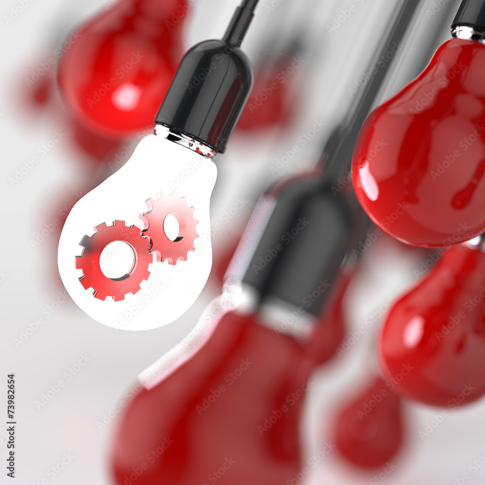 Naklejka premium light bulb with gears as leadership concept