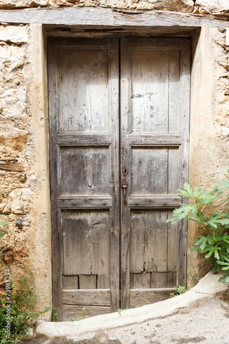 old vintage green wooden door © miklyxa