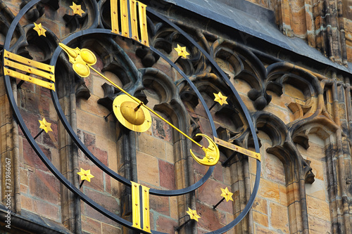 Clock of St. Vitus Gothic Cathedral in Prague photo